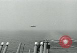 Image of British Royal Navy Hawker Seahawk aircraft practice arrested landings on the carrier USS Antietam Atlantic Ocean, 1953, second 60 stock footage video 65675048900