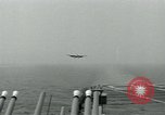 Image of British Royal Navy Hawker Seahawk aircraft practice arrested landings on the carrier USS Antietam Atlantic Ocean, 1953, second 61 stock footage video 65675048900