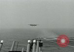 Image of British Royal Navy Hawker Seahawk aircraft practice arrested landings on the carrier USS Antietam Atlantic Ocean, 1953, second 62 stock footage video 65675048900