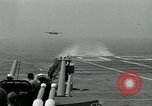 Image of British Royal Navy Vampire jet aircraft makes arrested landing aboard the U.S. carrier USS Antietam Atlantic Ocean, 1953, second 15 stock footage video 65675048902