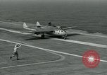 Image of British Royal Navy Vampire jet aircraft makes arrested landing aboard the U.S. carrier USS Antietam Atlantic Ocean, 1953, second 21 stock footage video 65675048902