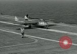 Image of British Royal Navy Vampire jet aircraft makes arrested landing aboard the U.S. carrier USS Antietam Atlantic Ocean, 1953, second 22 stock footage video 65675048902