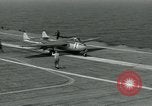 Image of British Royal Navy Vampire jet aircraft makes arrested landing aboard the U.S. carrier USS Antietam Atlantic Ocean, 1953, second 23 stock footage video 65675048902