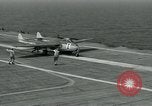 Image of British Royal Navy Vampire jet aircraft makes arrested landing aboard the U.S. carrier USS Antietam Atlantic Ocean, 1953, second 25 stock footage video 65675048902