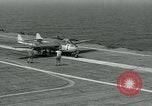 Image of British Royal Navy Vampire jet aircraft makes arrested landing aboard the U.S. carrier USS Antietam Atlantic Ocean, 1953, second 26 stock footage video 65675048902
