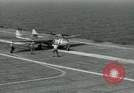 Image of British Royal Navy Vampire jet aircraft makes arrested landing aboard the U.S. carrier USS Antietam Atlantic Ocean, 1953, second 27 stock footage video 65675048902