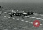 Image of British Royal Navy Vampire jet aircraft makes arrested landing aboard the U.S. carrier USS Antietam Atlantic Ocean, 1953, second 31 stock footage video 65675048902