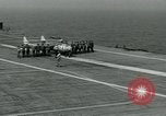 Image of British Royal Navy Vampire jet aircraft makes arrested landing aboard the U.S. carrier USS Antietam Atlantic Ocean, 1953, second 34 stock footage video 65675048902