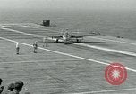 Image of British Royal Navy Vampire jet aircraft makes arrested landing aboard the U.S. carrier USS Antietam Atlantic Ocean, 1953, second 49 stock footage video 65675048902