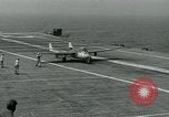 Image of British Royal Navy Vampire jet aircraft makes arrested landing aboard the U.S. carrier USS Antietam Atlantic Ocean, 1953, second 54 stock footage video 65675048902