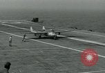 Image of British Royal Navy Vampire jet aircraft makes arrested landing aboard the U.S. carrier USS Antietam Atlantic Ocean, 1953, second 56 stock footage video 65675048902