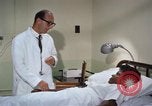 Image of hospital room scene Washington DC USA, 1965, second 32 stock footage video 65675048925
