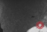 Image of USS Essex attacked by Kamikaze Pacific Theater, 1944, second 31 stock footage video 65675049006
