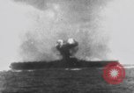 Image of USS Essex attacked by Kamikaze Pacific Theater, 1944, second 47 stock footage video 65675049006