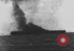 Image of USS Essex attacked by Kamikaze Pacific Theater, 1944, second 49 stock footage video 65675049006