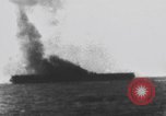Image of USS Essex attacked by Kamikaze Pacific Theater, 1944, second 50 stock footage video 65675049006