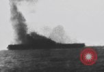 Image of USS Essex attacked by Kamikaze Pacific Theater, 1944, second 51 stock footage video 65675049006