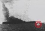 Image of USS Essex attacked by Kamikaze Pacific Theater, 1944, second 54 stock footage video 65675049006