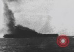 Image of USS Essex attacked by Kamikaze Pacific Theater, 1944, second 55 stock footage video 65675049006
