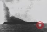 Image of USS Essex attacked by Kamikaze Pacific Theater, 1944, second 56 stock footage video 65675049006