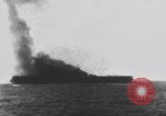 Image of USS Essex attacked by Kamikaze Pacific Theater, 1944, second 57 stock footage video 65675049006