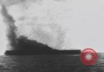 Image of USS Essex attacked by Kamikaze Pacific Theater, 1944, second 58 stock footage video 65675049006