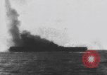 Image of USS Essex attacked by Kamikaze Pacific Theater, 1944, second 60 stock footage video 65675049006