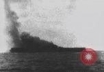 Image of USS Essex attacked by Kamikaze Pacific Theater, 1944, second 61 stock footage video 65675049006