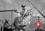 Image of USS Minneapolis (CA-36) firing guns in battle for  Wake Island Pacific Theater, 1942, second 1 stock footage video 65675049022