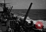 Image of USS Minneapolis (CA-36) firing guns in battle for  Wake Island Pacific Theater, 1942, second 18 stock footage video 65675049022