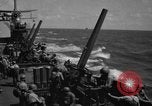 Image of USS Minneapolis (CA-36) firing guns in battle for  Wake Island Pacific Theater, 1942, second 23 stock footage video 65675049022