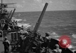Image of USS Minneapolis (CA-36) firing guns in battle for  Wake Island Pacific Theater, 1942, second 31 stock footage video 65675049022