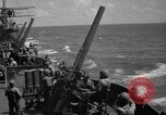 Image of USS Minneapolis (CA-36) firing guns in battle for  Wake Island Pacific Theater, 1942, second 32 stock footage video 65675049022