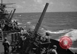 Image of USS Minneapolis (CA-36) firing guns in battle for  Wake Island Pacific Theater, 1942, second 33 stock footage video 65675049022