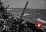 Image of USS Minneapolis (CA-36) firing guns in battle for  Wake Island Pacific Theater, 1942, second 37 stock footage video 65675049022