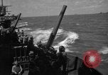 Image of USS Minneapolis (CA-36) firing guns in battle for  Wake Island Pacific Theater, 1942, second 50 stock footage video 65675049022