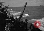 Image of USS Minneapolis (CA-36) firing guns in battle for  Wake Island Pacific Theater, 1942, second 51 stock footage video 65675049022