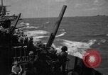 Image of USS Minneapolis (CA-36) firing guns in battle for  Wake Island Pacific Theater, 1942, second 52 stock footage video 65675049022