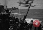 Image of USS Minneapolis (CA-36) firing guns in battle for  Wake Island Pacific Theater, 1942, second 60 stock footage video 65675049022