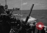 Image of USS Minneapolis (CA-36) firing guns in battle for  Wake Island Pacific Theater, 1942, second 61 stock footage video 65675049022