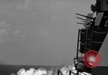 Image of Japanese aircraft attacking the USS Yorktown (CV-10) Pacific Theater, 1944, second 53 stock footage video 65675049026
