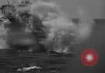 Image of Japanese aircraft attacking the USS Yorktown (CV-10) Pacific Theater, 1944, second 55 stock footage video 65675049026