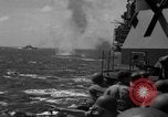 Image of Japanese aircraft attacking the USS Yorktown (CV-10) Pacific Theater, 1944, second 62 stock footage video 65675049026