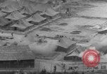 Standbild nordkoreanischen gefangenen Ausschreitungen United States USA, 1952, aus Sekunde 21 historischem Filmmaterial Videoclip 65675049159