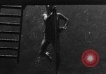 Image of a Navy diver training United States USA, 1943, second 17 stock footage video 65675049207