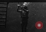 Image of a Navy diver training United States USA, 1943, second 20 stock footage video 65675049207