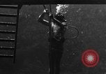 Image of a Navy diver training United States USA, 1943, second 21 stock footage video 65675049207