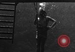 Image of a Navy diver training United States USA, 1943, second 23 stock footage video 65675049207