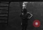 Image of a Navy diver training United States USA, 1943, second 24 stock footage video 65675049207