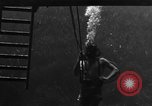 Image of a Navy diver training United States USA, 1943, second 25 stock footage video 65675049207